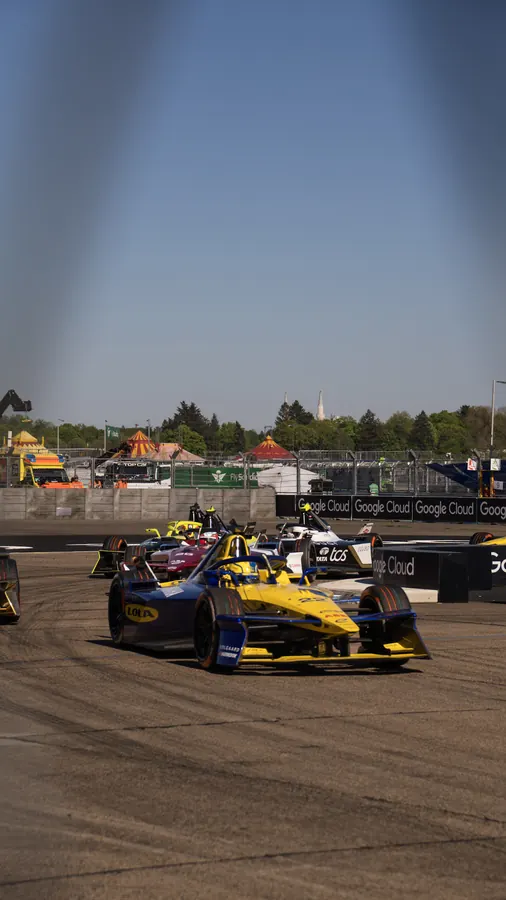 Yellow Formula E car on track, Berlin Tempelhof
