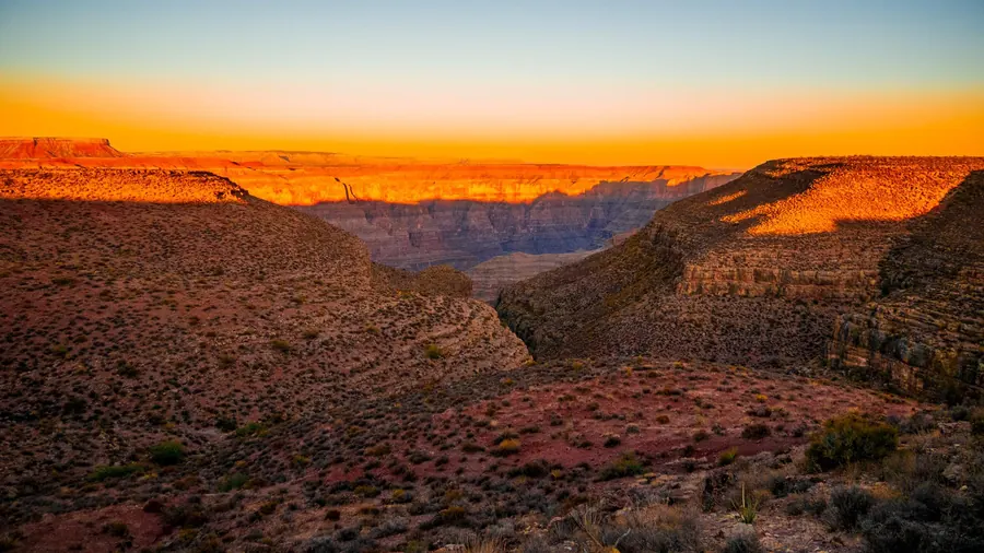 Grand Canyon glowing red at sunset, Arizona